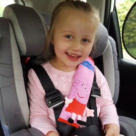 Millie in her special needs car seat